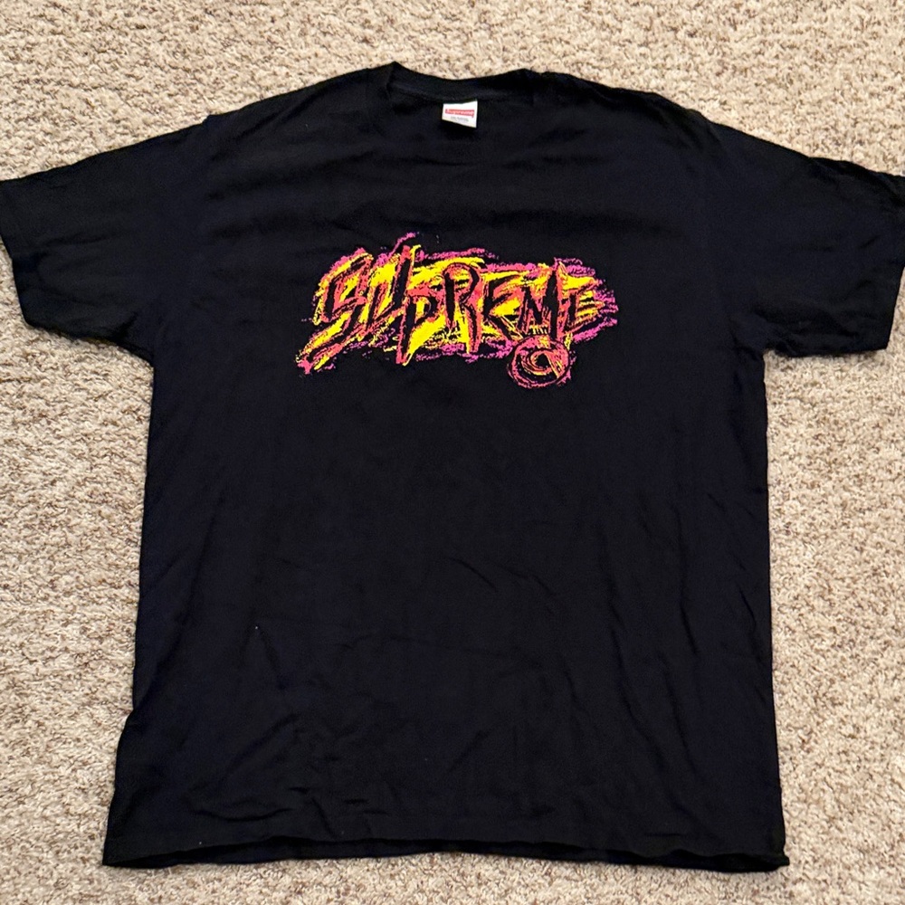 Supreme Black Tee with Vibrant Graphic
